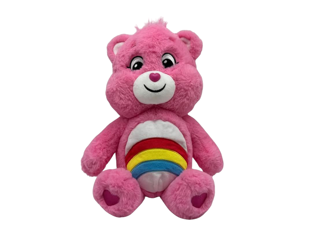 Cheer Care Bear. Pink bear with rainbow style belly badge with the colours red, yellow then blue and pink love heart shaped paw pads.