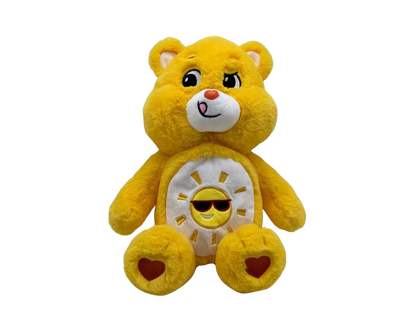 Funshine Care Bear. Yellow bear with a sunshine with sunglasses belly badge and red love hear paw pads